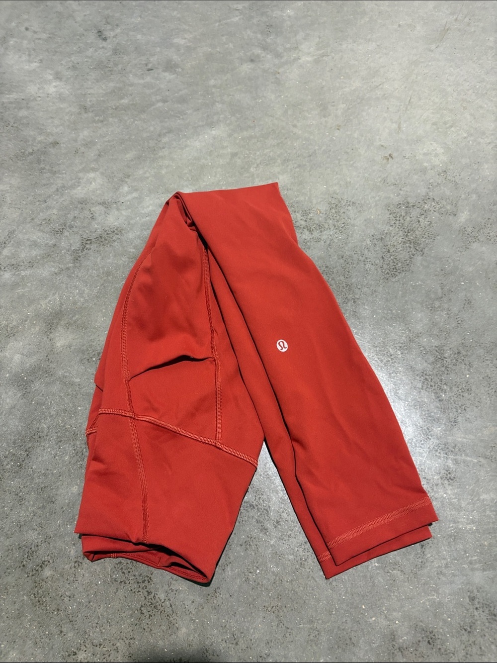 Burnt Orange Lululemon Wunder Train High-Rise Tight With Pockets 25”
